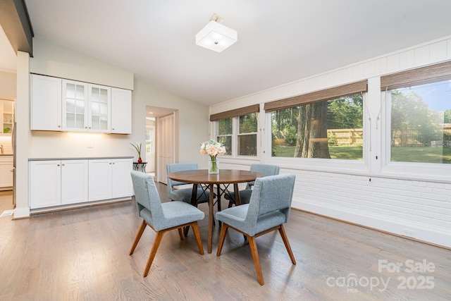 5742 Murrayhill Rd, Charlotte, NC 28210 - dining area with lofted ceiling and wood finished floors