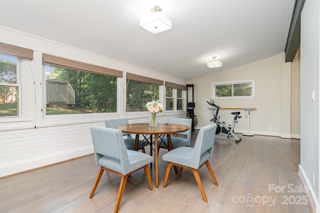 5742 Murrayhill Rd, Charlotte, NC 28210 - dining space with wood finished floors, healthy amount of natural light, and lofted ceiling