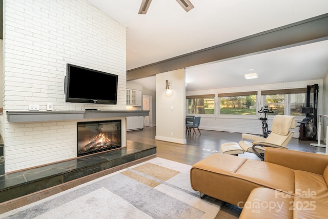 5742 Murrayhill Rd, Charlotte, NC 28210 - living area with wood finished floors, a fireplace, and ceiling fan