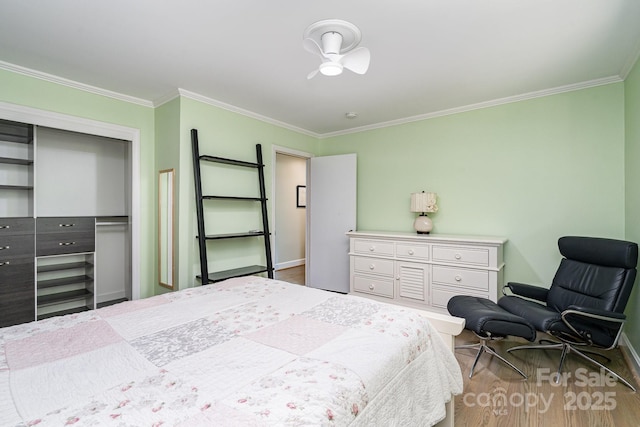 5742 Murrayhill Rd, Charlotte, NC 28210 - bedroom with ornamental molding, wood finished floors, and a closet