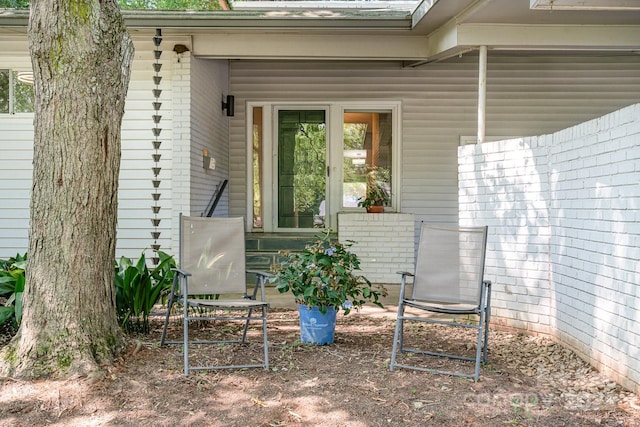5742 Murrayhill Rd, Charlotte, NC 28210 - doorway to property featuring brick siding