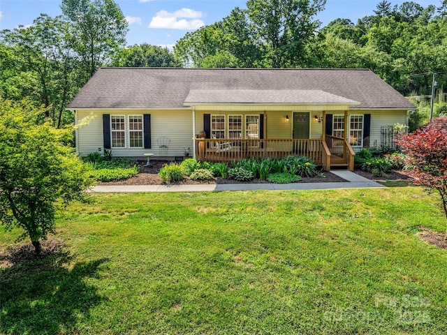 2941 Nix Creek Rd, Marion, NC 28752 - ranch-style home featuring a front lawn, a porch, and a shingled roof