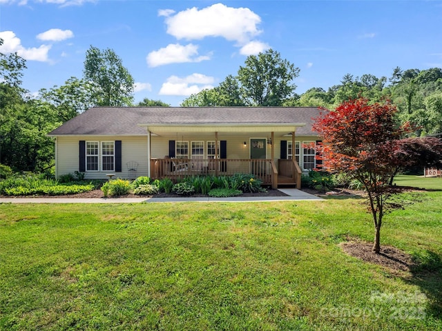 2941 Nix Creek Rd, Marion, NC 28752 - ranch-style house featuring covered porch and a front lawn