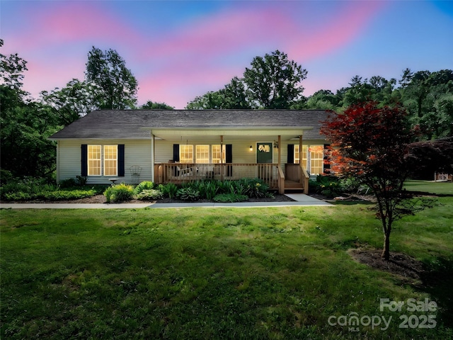 2941 Nix Creek Rd, Marion, NC 28752 - ranch-style home featuring covered porch and a yard