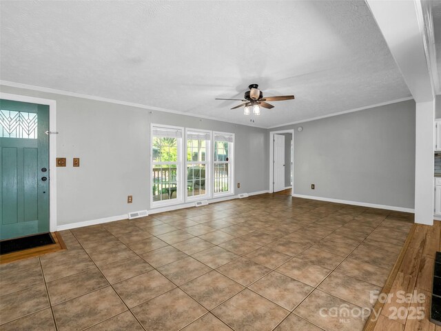 2941 Nix Creek Rd, Marion, NC 28752 - unfurnished living room with a ceiling fan, a textured ceiling, baseboards, tile patterned floors, and crown molding