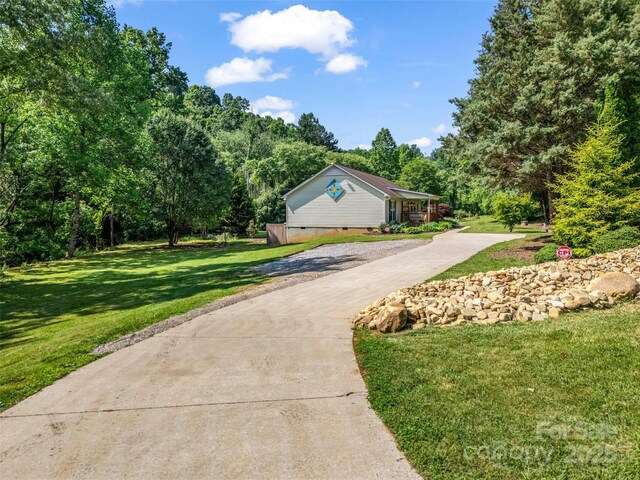 2941 Nix Creek Rd, Marion, NC 28752 - view of front of home with crawl space, driveway, and a front yard