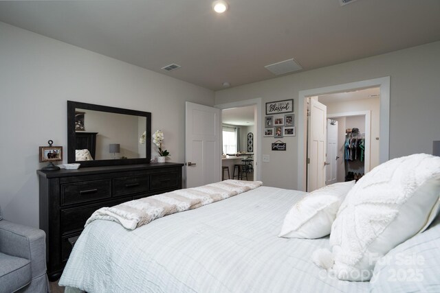 154 Stella Ln Unit A, Troutman, NC 28166 - bedroom featuring a spacious closet and a closet