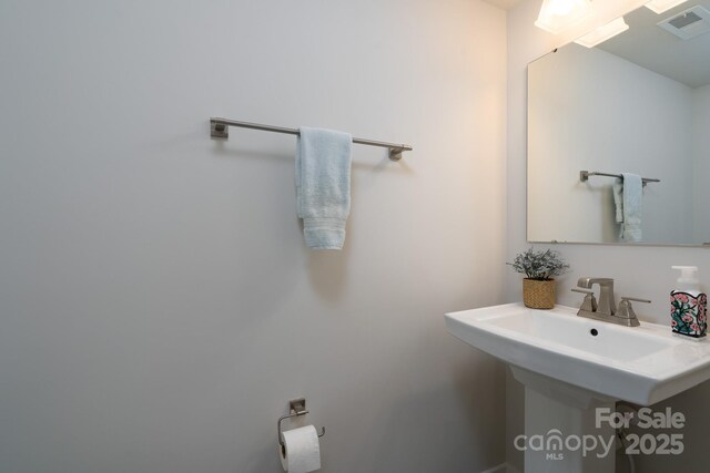 154 Stella Ln Unit A, Troutman, NC 28166 - bathroom featuring a sink