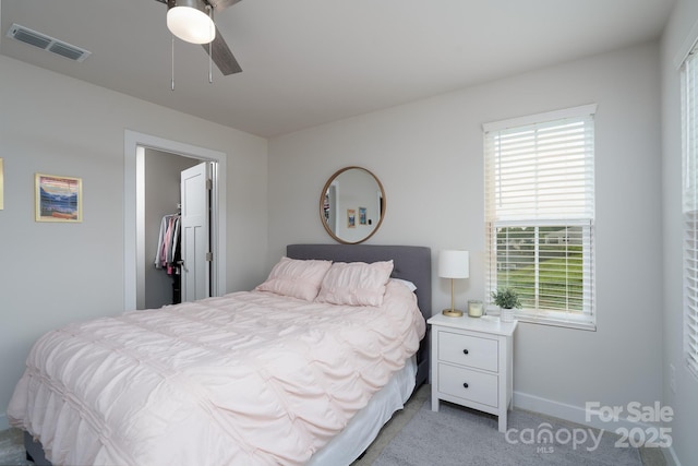 154 Stella Ln Unit A, Troutman, NC 28166 - bedroom featuring light carpet and ceiling fan