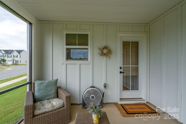 154 Stella Ln Unit A, Troutman, NC 28166 - property entrance with board and batten siding and a lawn