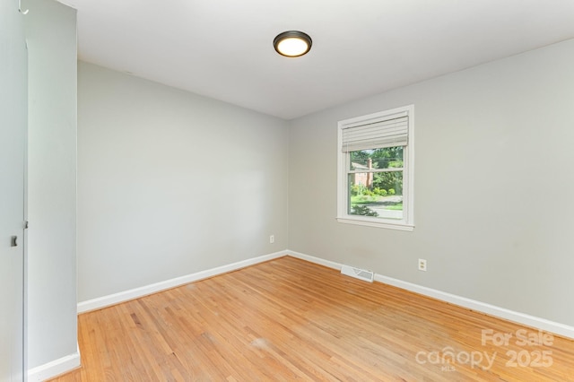 4014 Sulkirk Rd, Charlotte, NC 28210 - spare room with baseboards and light wood-style flooring