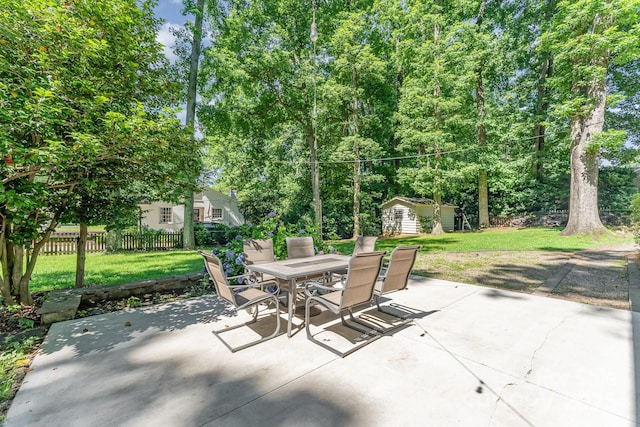 4014 Sulkirk Rd, Charlotte, NC 28210 - view of patio featuring outdoor dining area and a storage shed