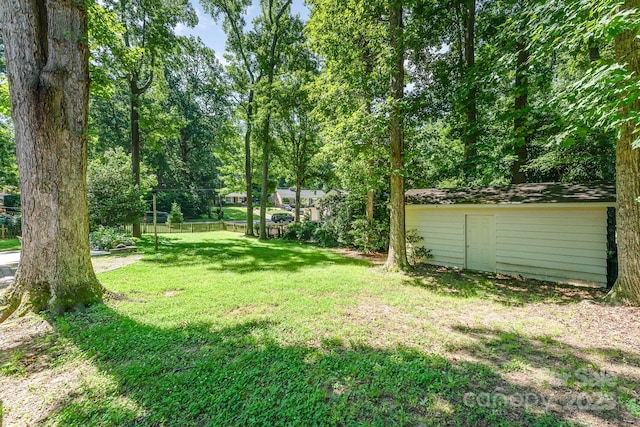 4014 Sulkirk Rd, Charlotte, NC 28210 - view of green lawn with an outdoor structure