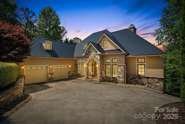 122 Eagles Crest Way, Lake Lure, NC 28746 - view of front of house featuring stone siding, stucco siding, and a metal roof