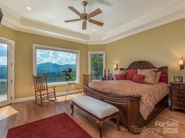 122 Eagles Crest Way, Lake Lure, NC 28746 - bedroom with a raised ceiling, access to exterior, light wood finished floors, crown molding, and a mountain view