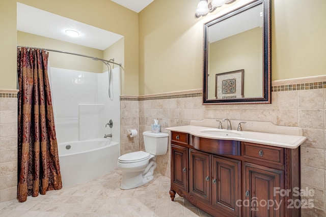 122 Eagles Crest Way, Lake Lure, NC 28746 - full bathroom with tile walls, shower / bathtub combination with curtain, vanity, and wainscoting