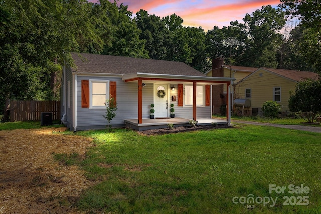 405 E 18th St, Kannapolis, NC 28083 - bungalow-style home featuring covered porch and a chimney