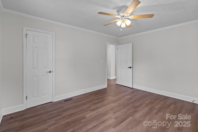 405 E 18th St, Kannapolis, NC 28083 - spare room with a ceiling fan, wood finished floors, and ornamental molding