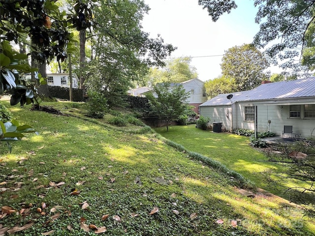 511 Westview St SW, Lenoir, NC 28645 - view of grassy yard featuring a patio and central AC unit