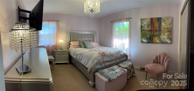 106 Condover Pl, Charlotte, NC 28270 - carpeted bedroom featuring a chandelier and lofted ceiling