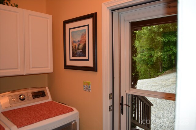 394 Hummingbird Ln, Elk Park, NC 28622 - laundry area with washer / clothes dryer and cabinet space