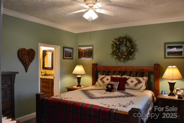 394 Hummingbird Ln, Elk Park, NC 28622 - bedroom featuring a textured ceiling, ornamental molding, ensuite bathroom, a sink, and a ceiling fan