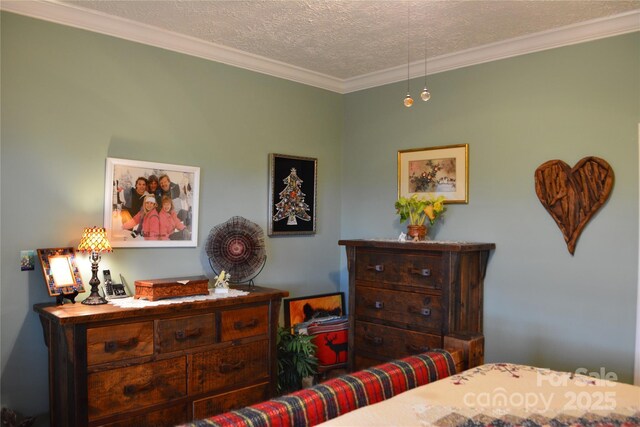 394 Hummingbird Ln, Elk Park, NC 28622 - bedroom featuring a textured ceiling and ornamental molding