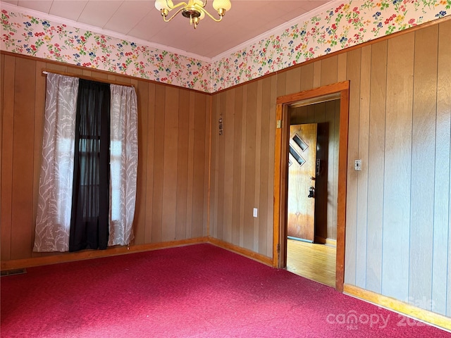 28 Central Ave, Granite Falls, NC 28630 - carpeted empty room featuring wallpapered walls, a chandelier, and crown molding