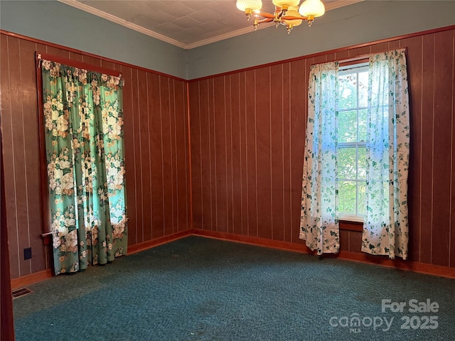 28 Central Ave, Granite Falls, NC 28630 - carpeted empty room with a chandelier, wooden walls, and ornamental molding