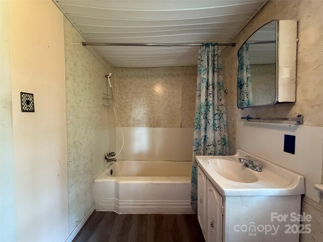 28 Central Ave, Granite Falls, NC 28630 - full bathroom featuring wood finished floors, shower / bathtub combination with curtain, and vanity