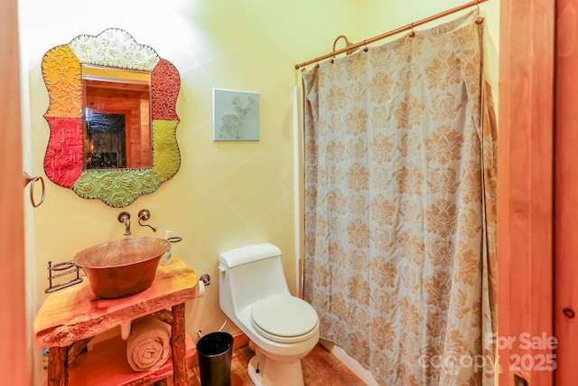 184 Sunlight Path, Lake Lure, NC 28746 - bathroom featuring vanity, tile patterned floors, and curtained shower