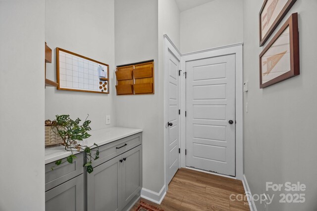 11329 Fullerton Place Dr NW, Huntersville, NC 28078 - hallway featuring wood finished floors and baseboards