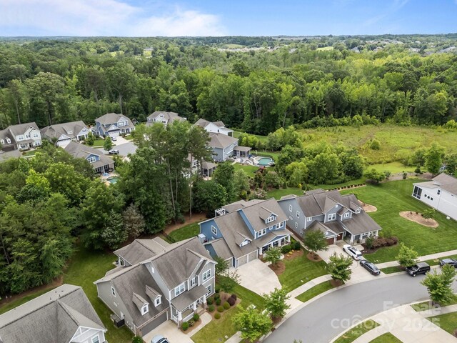 11329 Fullerton Place Dr NW, Huntersville, NC 28078 - aerial perspective of suburban area with a heavily wooded area
