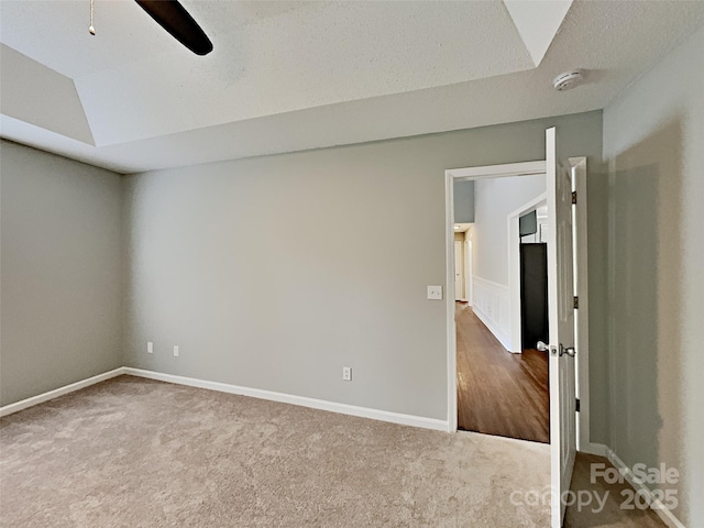 120 Todd Dr NW, Concord, NC 28025 - carpeted spare room with a smoke detector, vaulted ceiling, a ceiling fan, and baseboards