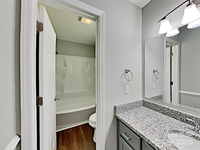 120 Todd Dr NW, Concord, NC 28025 - full bath featuring vanity, wood finished floors, toilet, and  shower combination