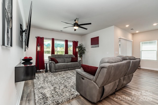 9274 Dunwich Dr, Gastonia, NC 28056 - living room with wood finished floors, a ceiling fan, plenty of natural light, baseboards, and recessed lighting