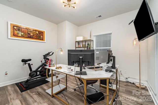 9274 Dunwich Dr, Gastonia, NC 28056 - office space with wood finished floors, baseboards, and a chandelier