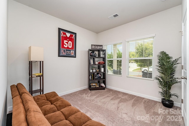 9274 Dunwich Dr, Gastonia, NC 28056 - living area with carpet floors and baseboards