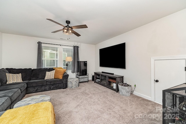 9274 Dunwich Dr, Gastonia, NC 28056 - carpeted living area featuring ceiling fan and baseboards