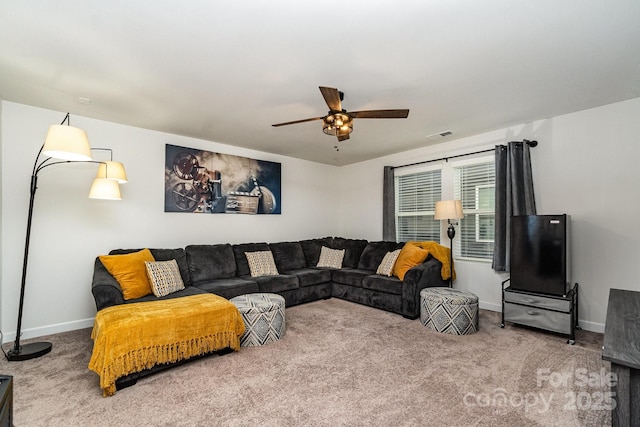 9274 Dunwich Dr, Gastonia, NC 28056 - carpeted living room with a ceiling fan and baseboards
