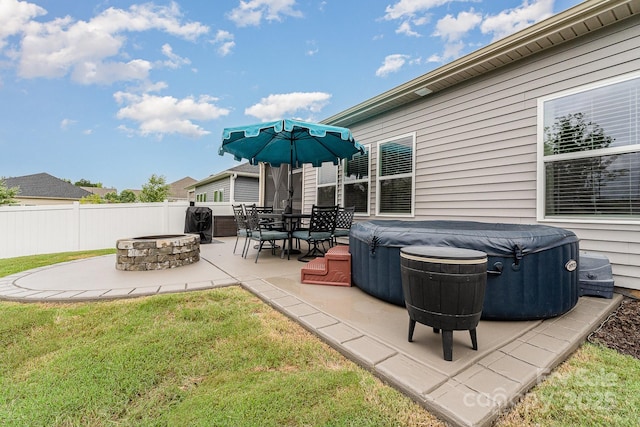 9274 Dunwich Dr, Gastonia, NC 28056 - view of patio featuring a hot tub and a fire pit