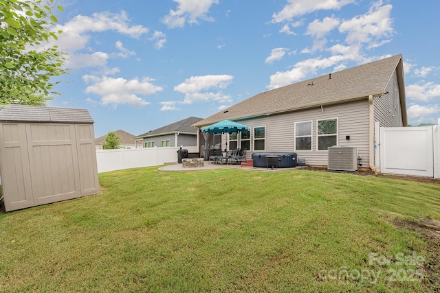 9274 Dunwich Dr, Gastonia, NC 28056 - back of property featuring a hot tub, a patio area, and cooling unit