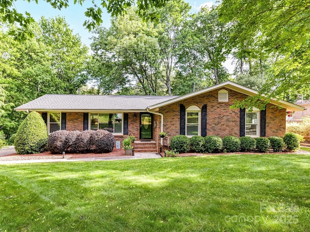 13617 Lake Bluff Dr, Matthews, NC 28105 - single story home featuring brick siding and a front lawn
