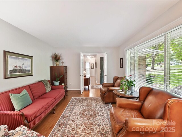 13617 Lake Bluff Dr, Matthews, NC 28105 - living area with wood finished floors and baseboards