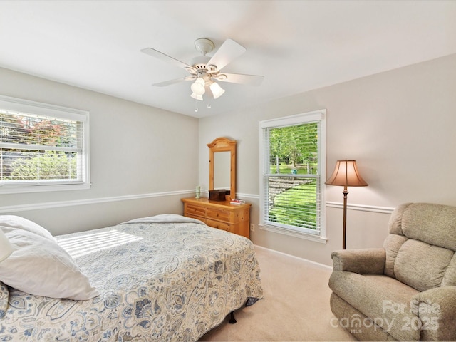 13617 Lake Bluff Dr, Matthews, NC 28105 - bedroom featuring carpet flooring, multiple windows, and a ceiling fan