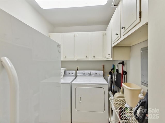 13617 Lake Bluff Dr, Matthews, NC 28105 - laundry room featuring cabinet space, independent washer and dryer, and electric panel