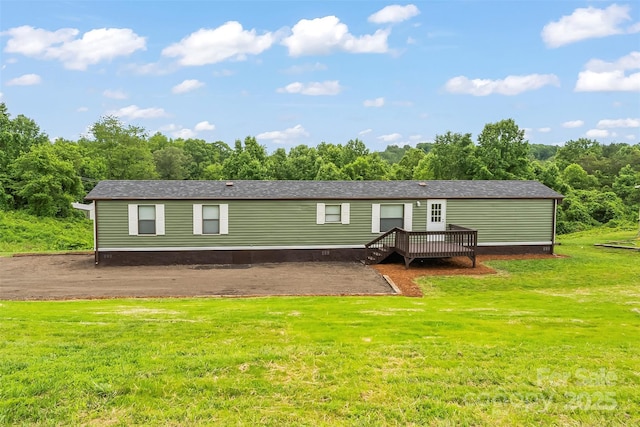 1712 NC-126 Hwy, Morganton, NC 28655 - rear view of house with a lawn and a deck