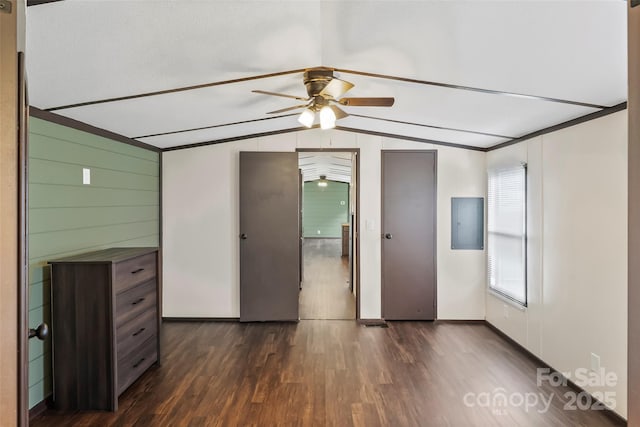 1712 NC-126 Hwy, Morganton, NC 28655 - unfurnished bedroom featuring dark wood-style flooring, vaulted ceiling, and electric panel
