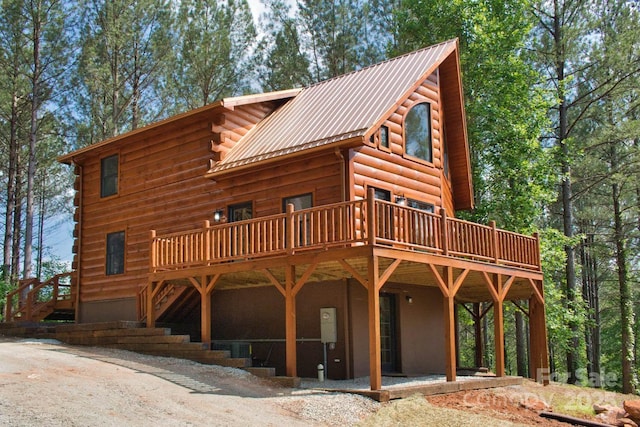 317 Knightsbridge Cir, Union Mills, NC 28167 - view of front of house featuring a deck and metal roof