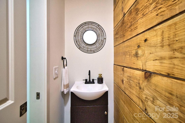 317 Knightsbridge Cir, Union Mills, NC 28167 - bathroom with vanity and wooden walls